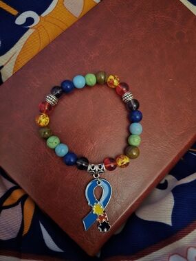 Multicolor Beaded Autism Awareness Bracelet with Blue Ribbon Charm